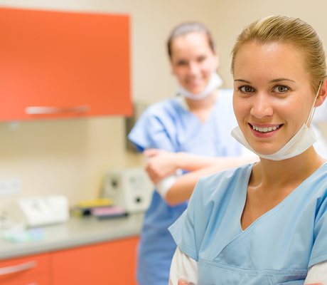 Smiling nurses from the Health Well Vibe care team in a bright clinic